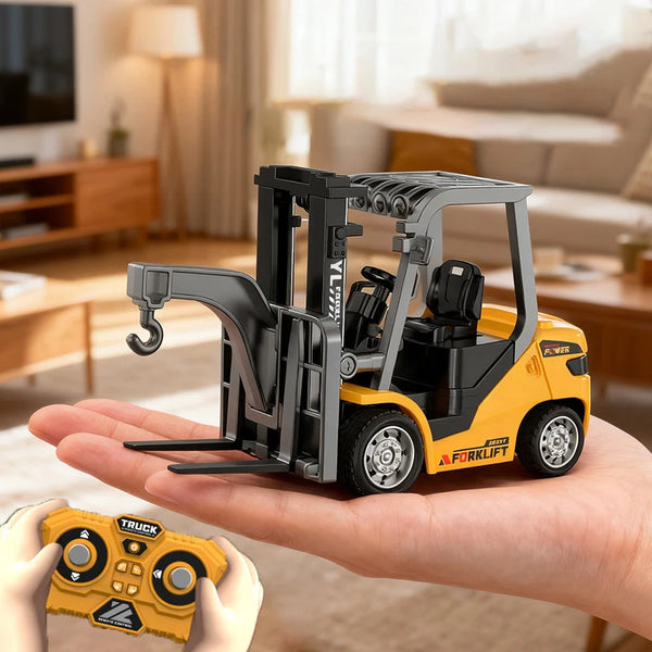 A yellow 1:64 scale remote control forklift excavator is held in a person's hand with a yellow controller nearby.