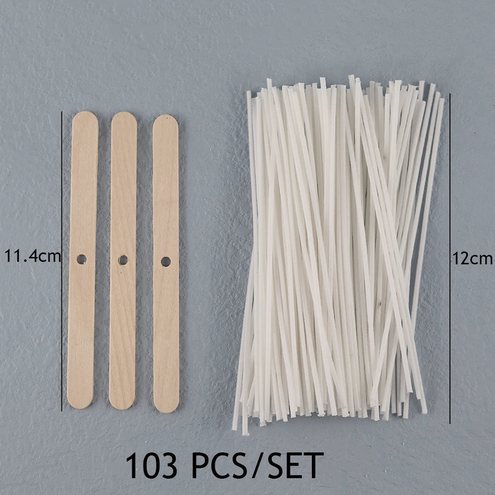 A set of 103 pre-waxed cotton candle wicks with metal sustainers shown next to a ruler for scale.