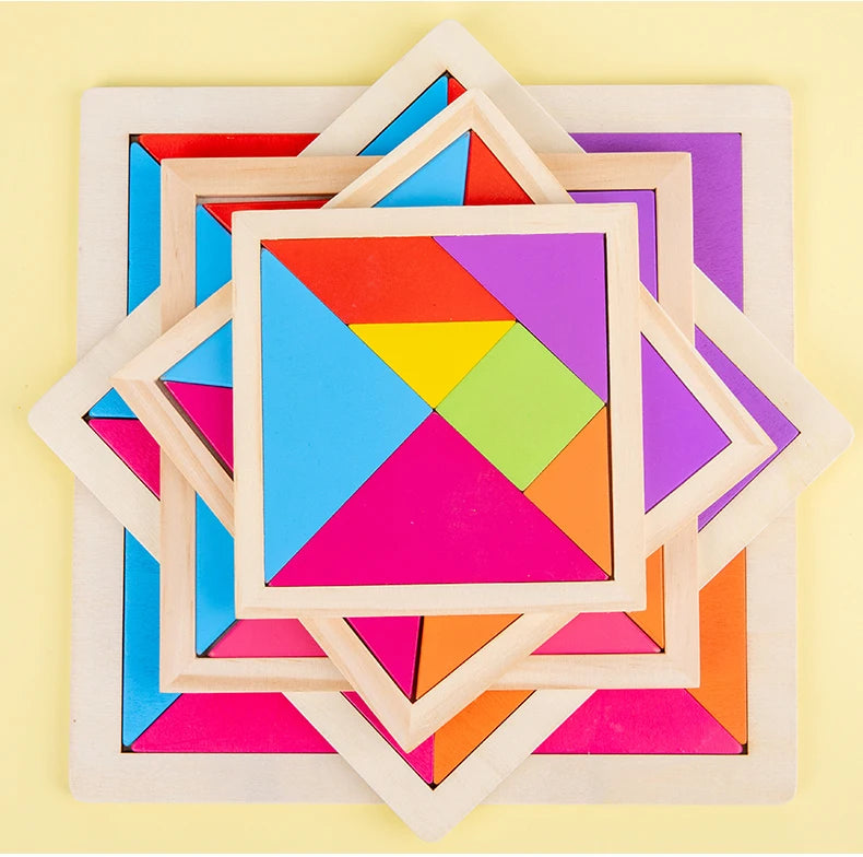 A colorful wooden tangram puzzle set featuring seven geometric pieces arranged in a star pattern on a light background.