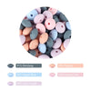 A circular arrangement of various pastel silicone lentil beads in shades including DimGray, Peachy, Pastel Blue, Quartz Pink,