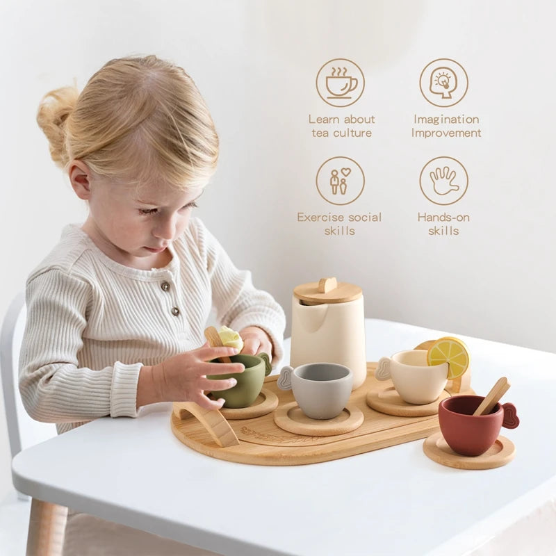 A young girl is playing with a wooden pretend tea party set, demonstrating social skills and imagination.