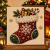 A detailed painting of a Christmas stocking decorated with red and green sequins, pearls, and gold accents on a canvas.