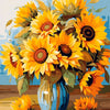 A bouquet of yellow sunflowers in a blue vase on a wooden surface.