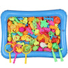 A blue inflatable pool contains a magnetic fishing game set filled with colorful plastic fish and sea creatures.