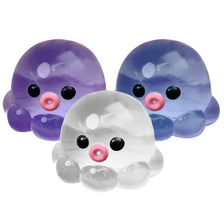 Three translucent squishy octopus stress balls in purple, blue, and white.