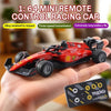 A red mini alloy remote control racing car is held in a hand, demonstrating its features.