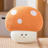 An orange mushroom plush toy with white polka dots sitting on a wooden surface.