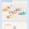 A collection of Miffy Dream keychains featuring a white rabbit charm in various pastel colors like blue, pink, and yellow.