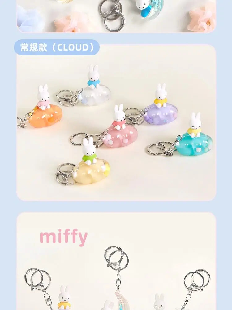 A collection of Miffy Dream keychains featuring a white rabbit charm in various pastel colors like blue, pink, and yellow.