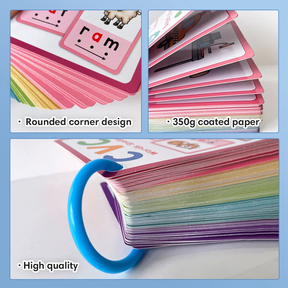 A stack of pink and green CVC word building cards with rounded corners and a blue ring binder.