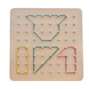 A wooden peg board featuring geometric shape patterns for educational activities.
