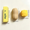 A yellow butter squeeze stress relief food-shaped squishy toy shown next to its packaging.