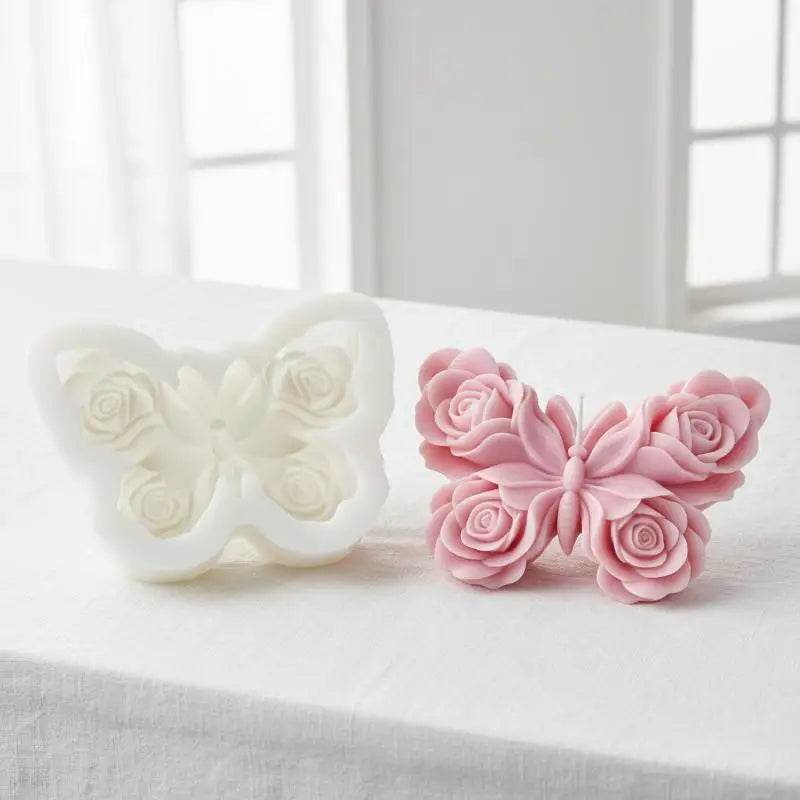 Two silicone molds shaped like pink and white roses forming a butterfly for candle and DIY crafts