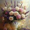 A beautiful floral arrangement featuring pink, purple, and cream roses and lavender on a white cloth.