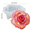 White silicone mold shaped like a rose flower for crafting candles, soap, and clay