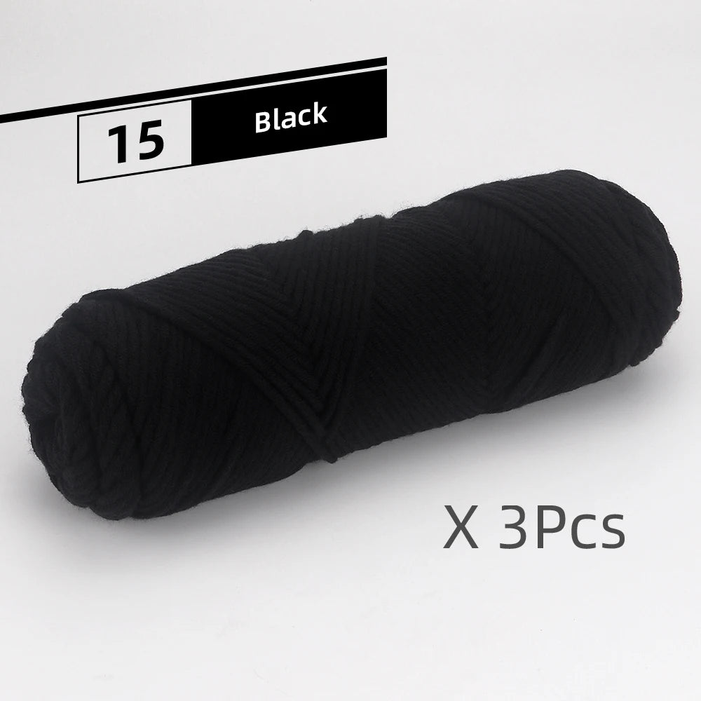 A black yarn package labeled 15, showing three balls of soft cotton blend yarn for knitting and crochet.