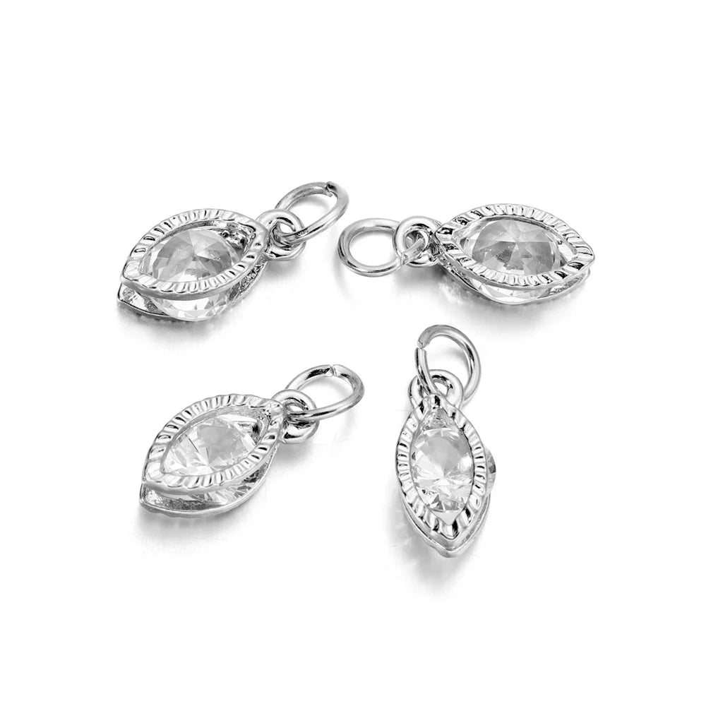 Silver rhinestone heart charms for jewelry making displayed on a white background.