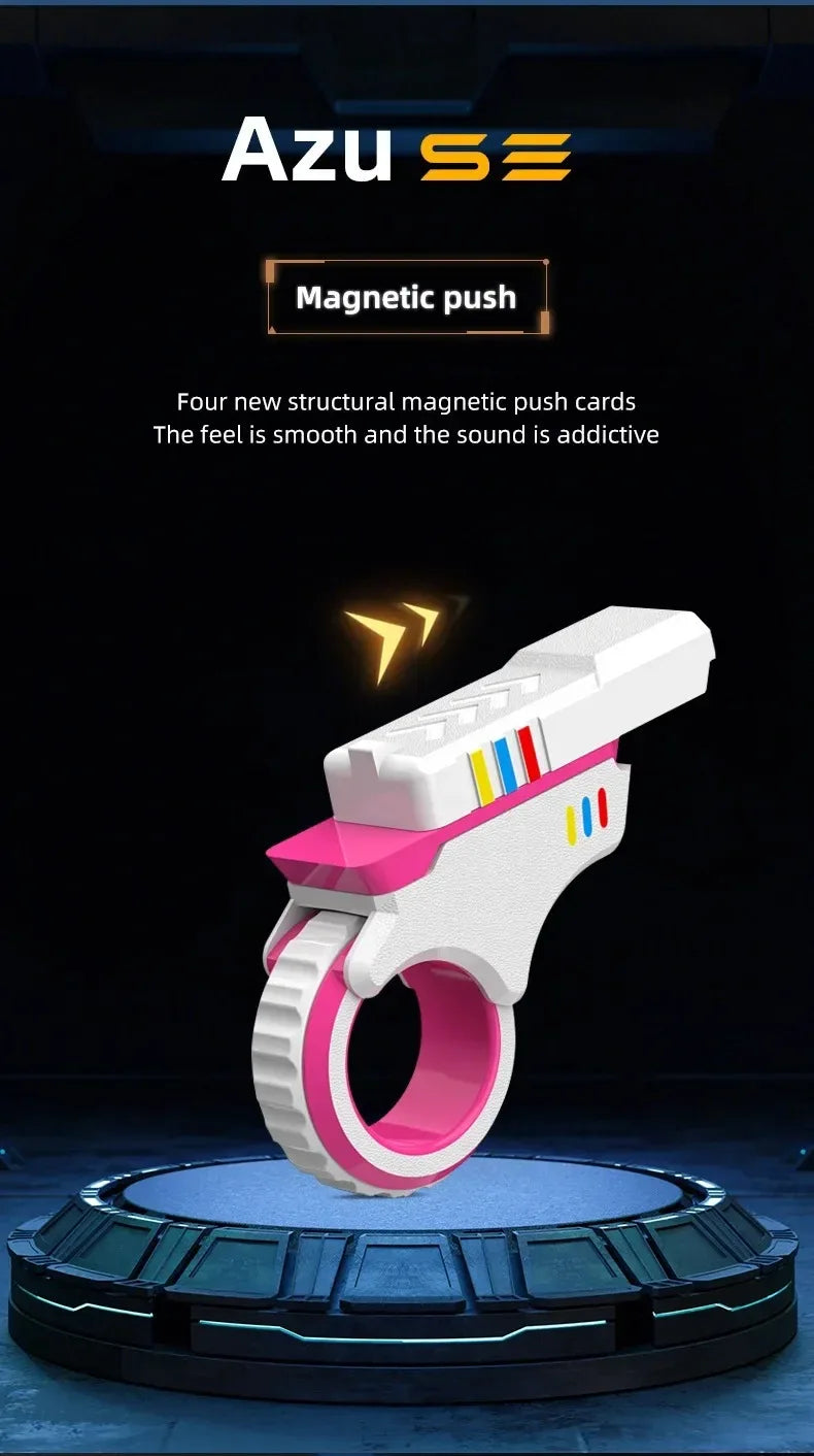 A white and pink magnetic push card with a spinner is displayed on a dark surface.
