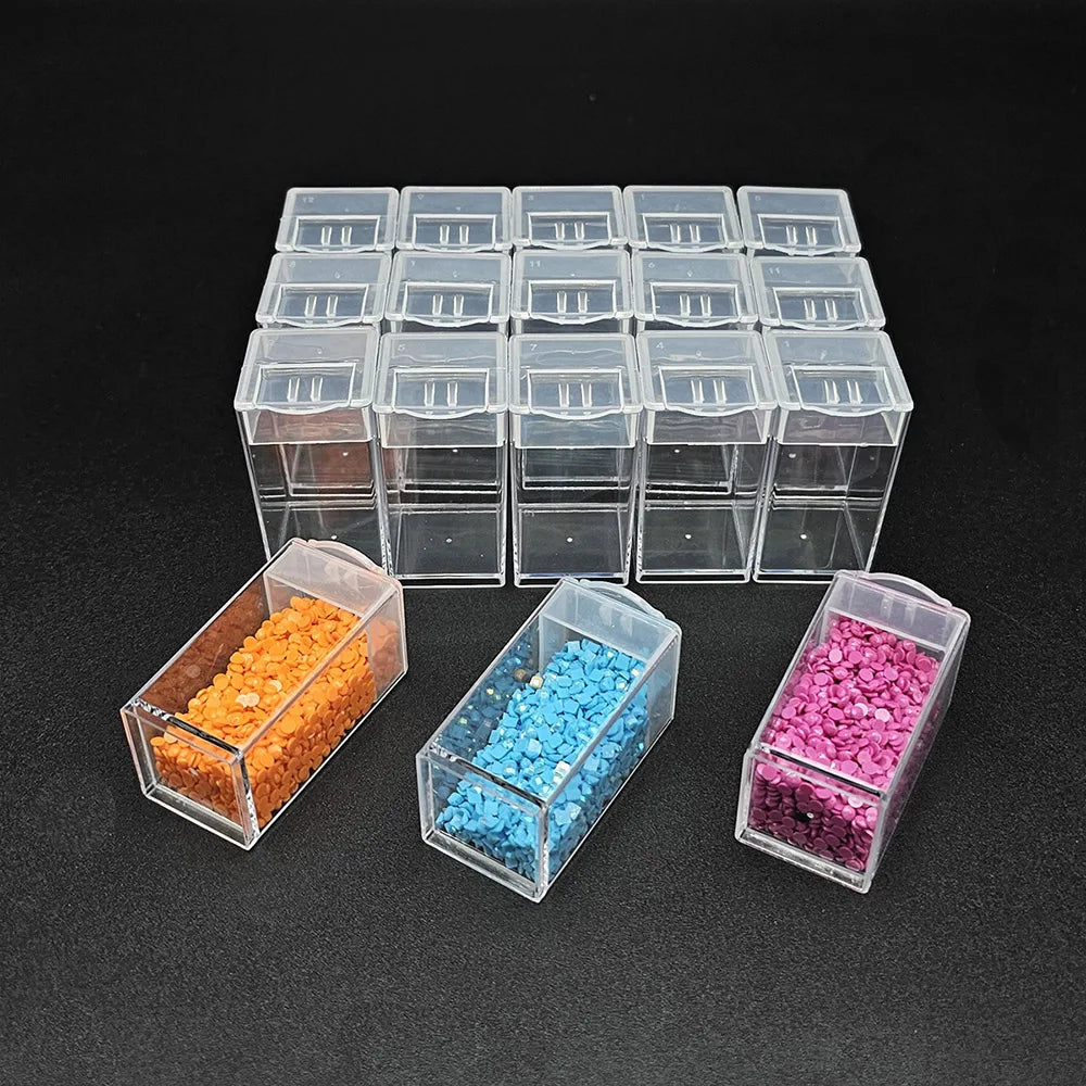 A collection of clear plastic diamond painting storage boxes filled with colored beads and organized in a grid.