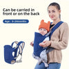 A woman is holding a blue baby carrier sling designed for infants, demonstrating it can be carried in front or on the back.