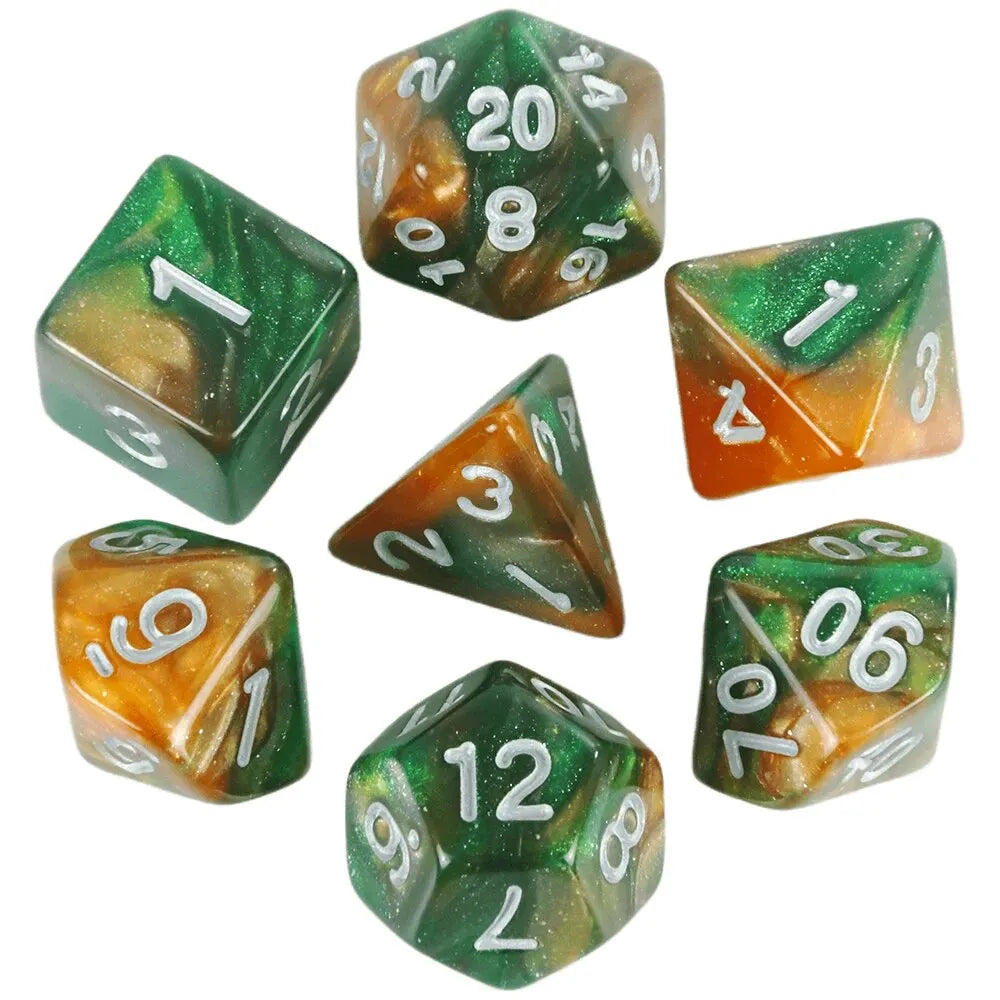 A set of polyhedral dice featuring a galaxy or cosmic effect with green and orange coloring.