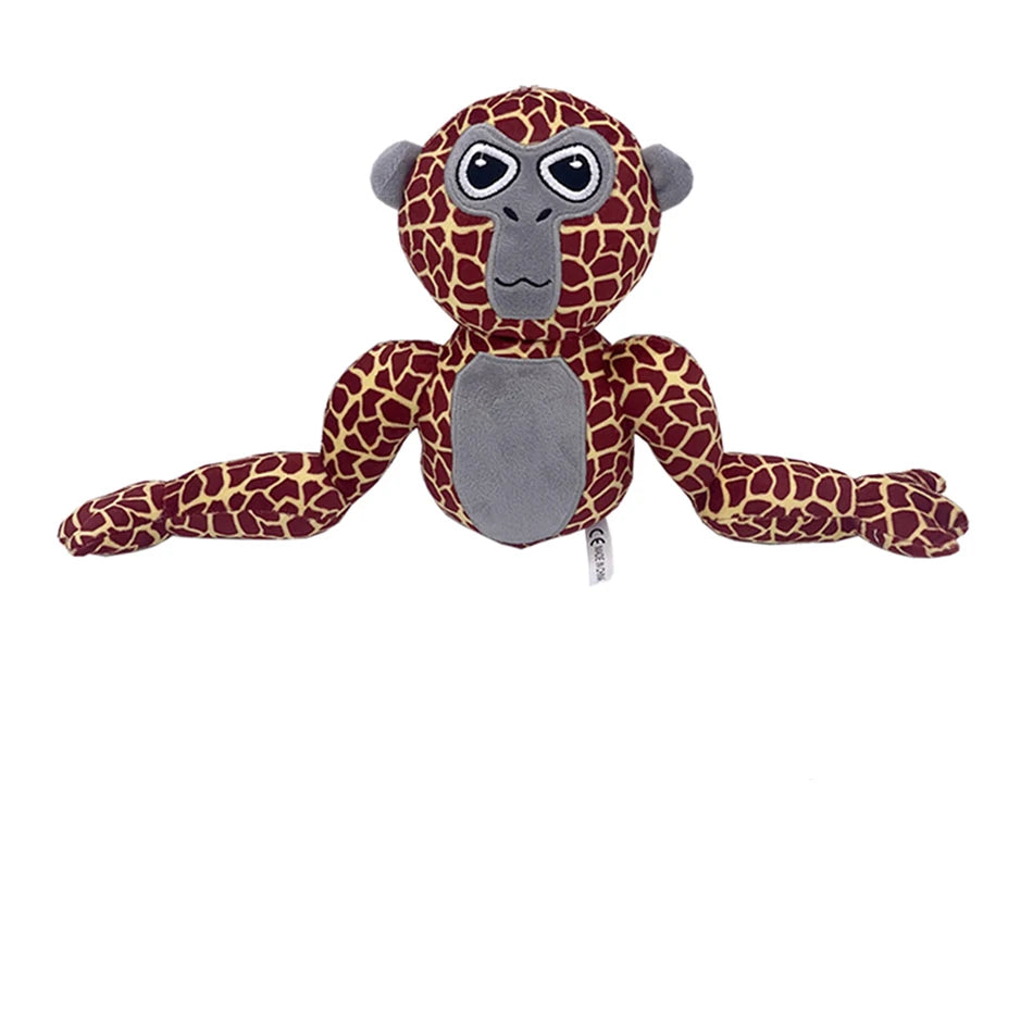 A plush toy of a monke gorilla with brown and black patterned fur and gray skin.