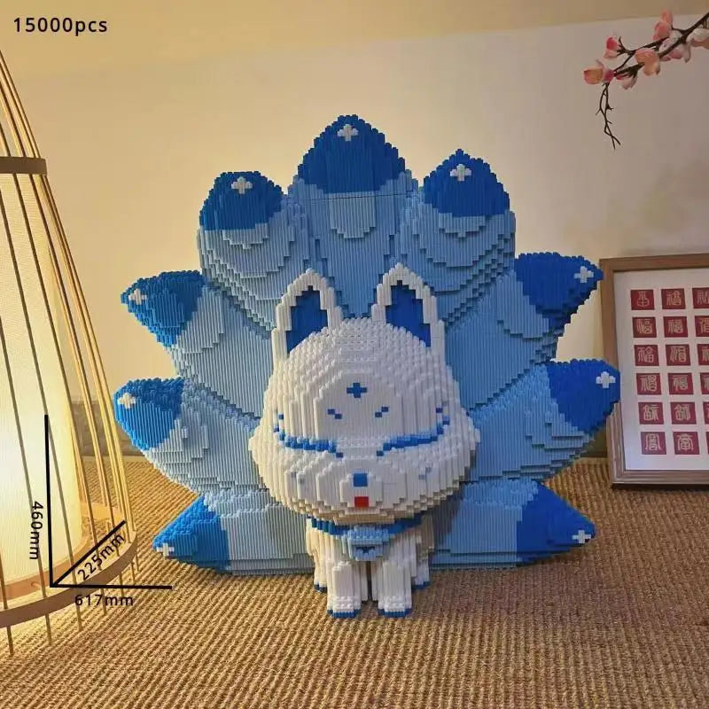 A large, detailed building block model of a nine-tailed fox in light blue and white, displayed on a carpet.