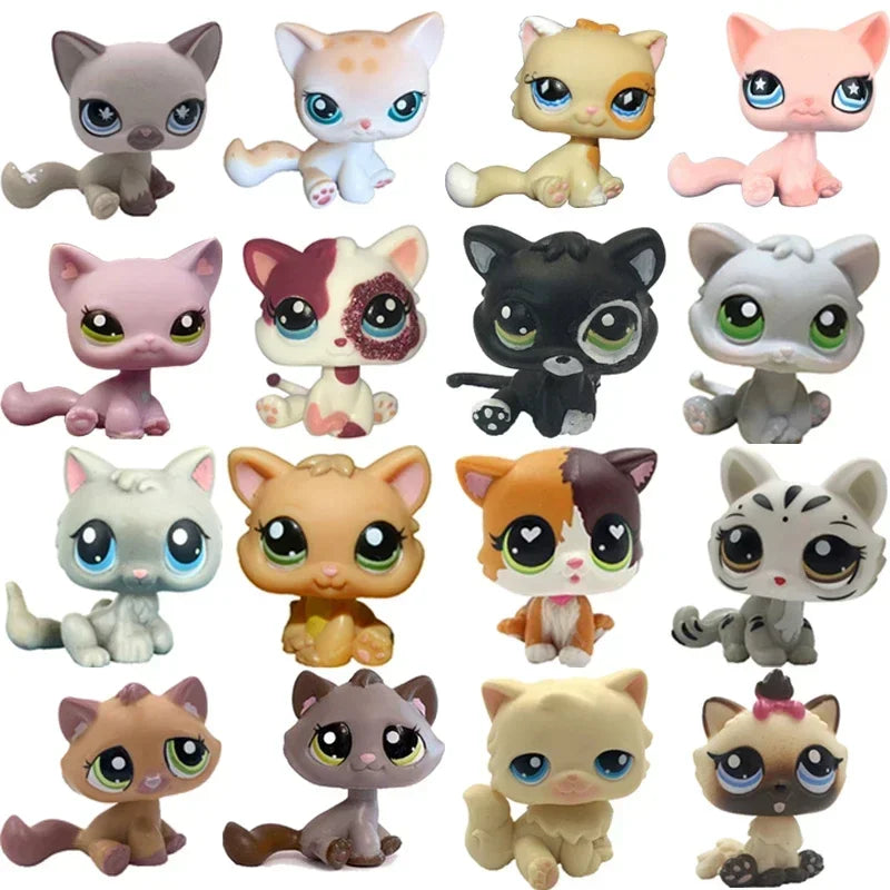 A collection of various charming bobble head pet figurines in different colors and breeds.
