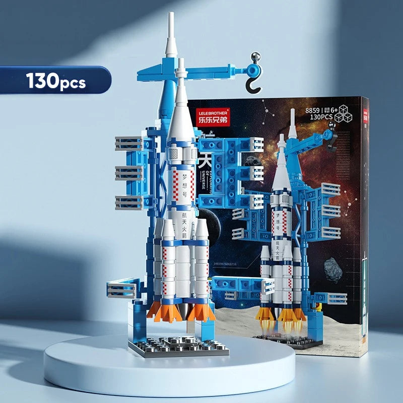 A blue and white space rocket building blocks set with a launch center displayed on a white base.