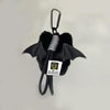 Black plush cat keychain and bag charm with a silver loop.
