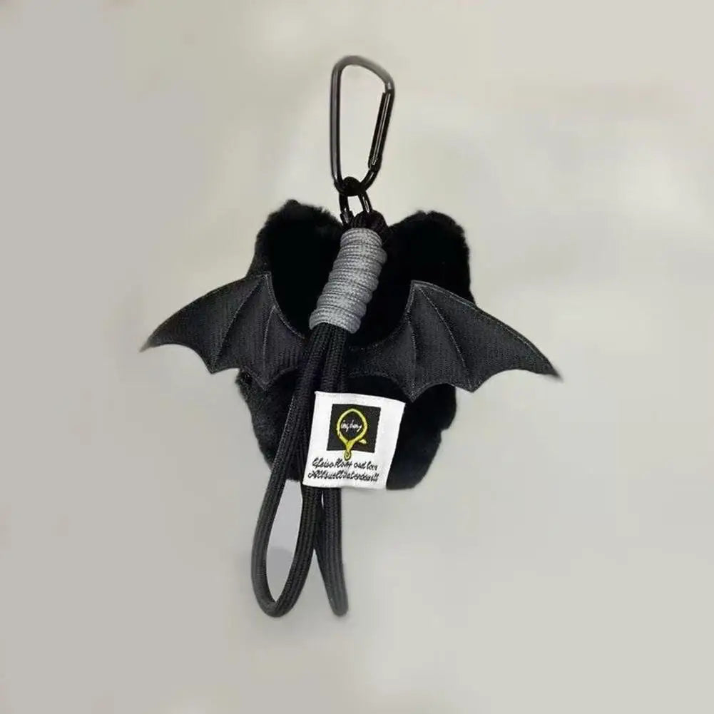 Black plush cat keychain and bag charm with a silver loop.