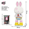 A white bear figure made of micro building blocks with pink ears and a red heart design.