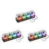 A set of illuminated stress-relief keychain toys with keyboard buttons in various colors.