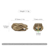A brass snake head bead for a paracord lanyard, showing its size and detail.