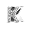A sterling silver alphabet charm shaped like the letter K, encrusted with cubic zirconia stones.