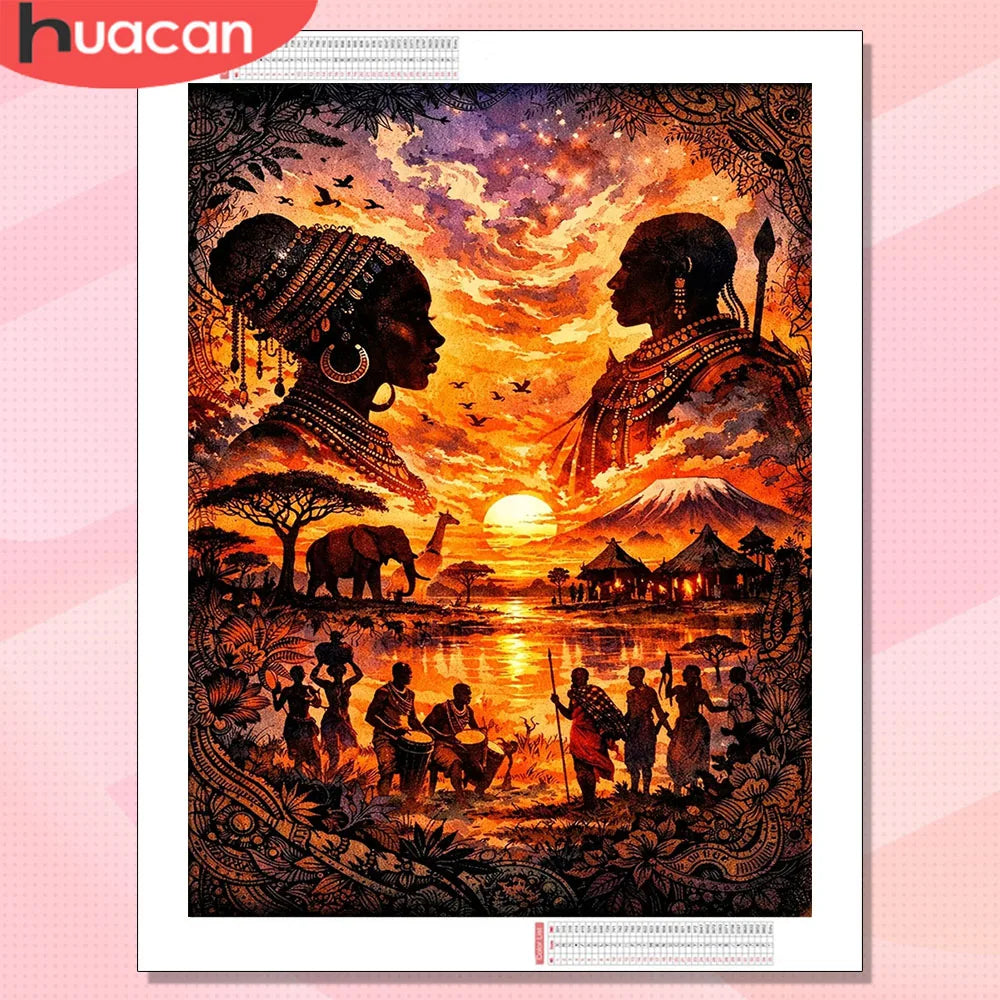 A vibrant sunset portrait featuring two figures in traditional attire against a fiery orange and yellow sky.