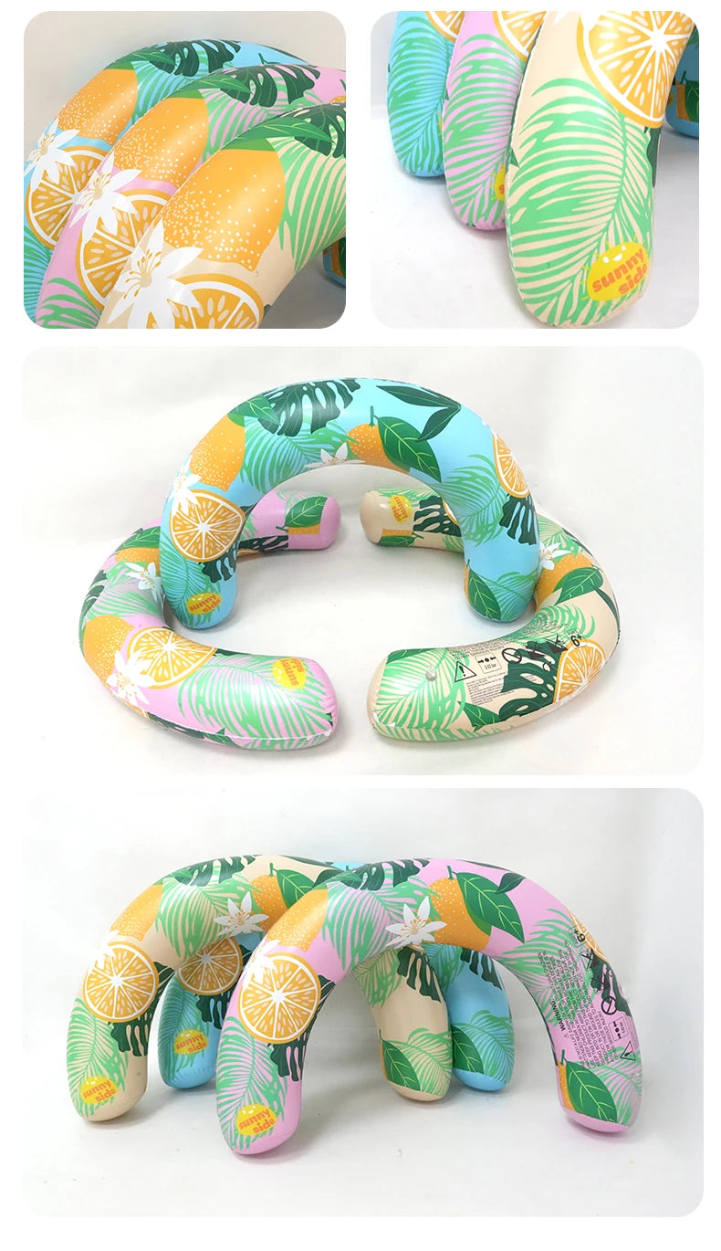 A colorful U-shaped inflatable swim ring with leaf and citrus patterns, shown in various close-up angles.