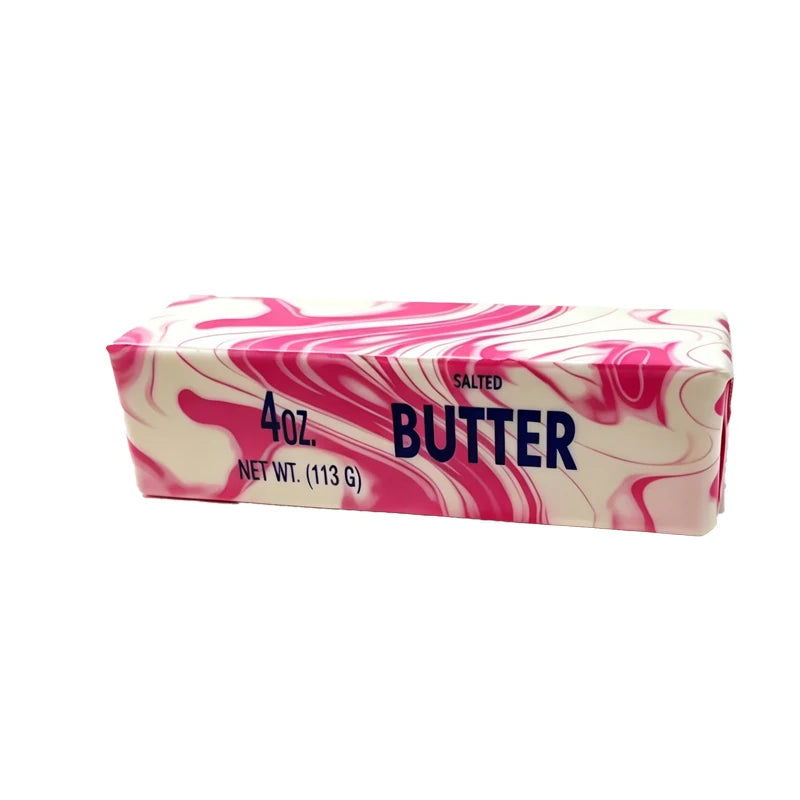 A rectangular box of salted butter squishy stress relief toy with pink and white marbled design.