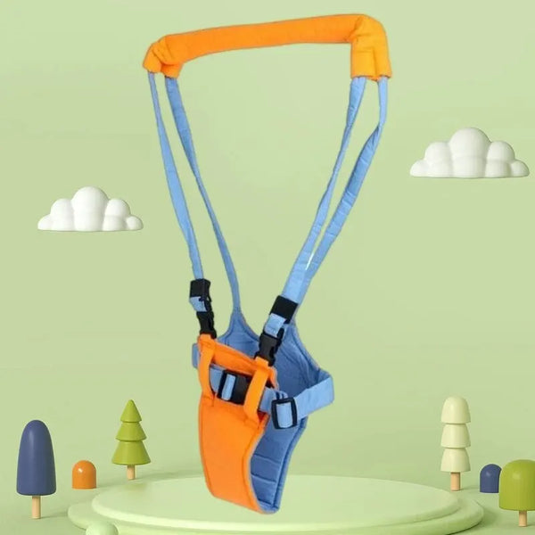 An orange and blue toddler learning walker harness is displayed against a light green background with small trees.