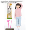 A young girl is holding a pink sweater and light blue pants, demonstrating the standard size of a ruler toy.