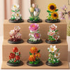 A collection of detailed miniature eternal flower gardens featuring various blooming flowers and greenery.