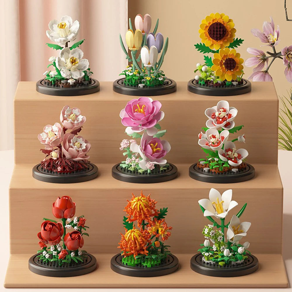 A collection of detailed miniature eternal flower gardens featuring various blooming flowers and greenery.