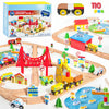 A wooden train set featuring a city scene with various trains and magnetic elements on a wooden track.