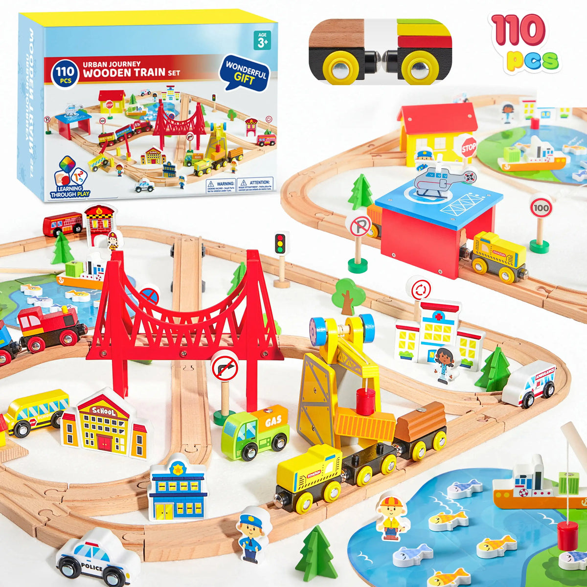 A wooden train set featuring a city scene with various trains and magnetic elements on a wooden track.