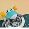 A blue and yellow interactive music crab toy designed for baby to crawl and strengthen muscles.