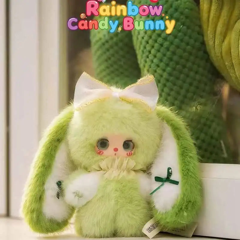 A fluffy green bunny plush toy with white accents and a bow, part of the Rainbow Candy Bunny series.