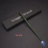 A green LED light-up magic wand is displayed diagonally across a dark box with the text Magic Wand printed on it.