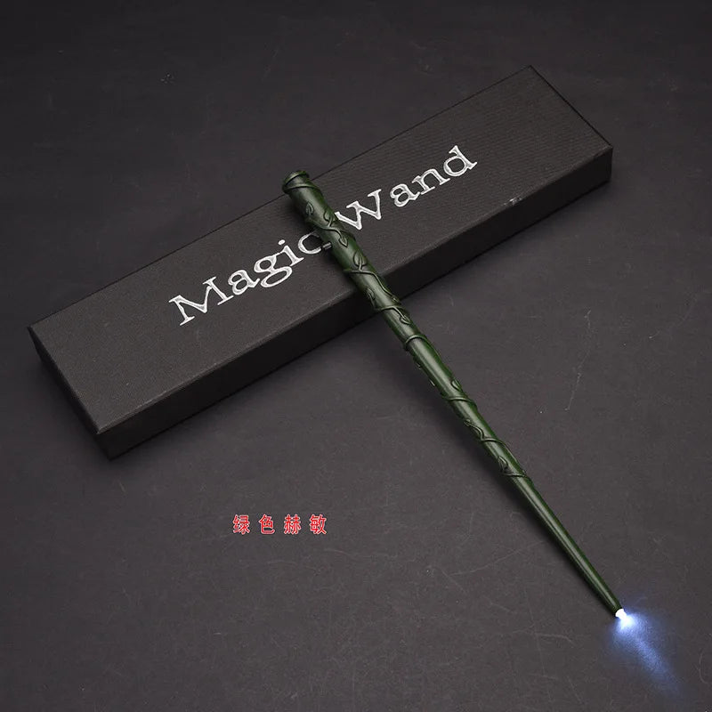 A green LED light-up magic wand is displayed diagonally across a dark box with the text Magic Wand printed on it.
