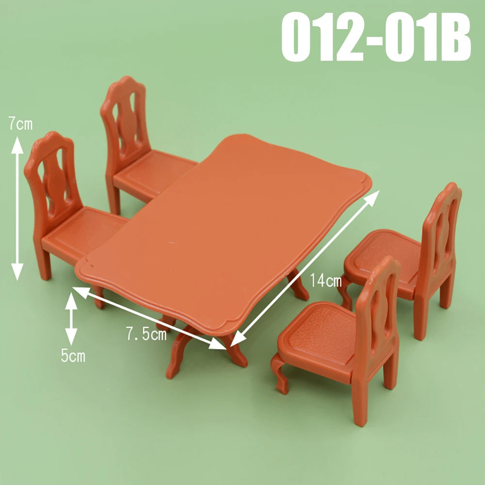A set of miniature dollhouse furniture including a table and four chairs in a terracotta orange color.