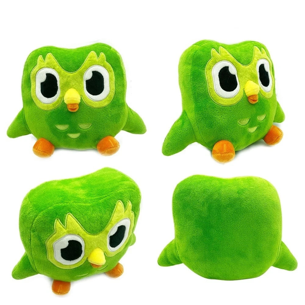 A set of four plush owl toys in various shades of green and yellow.